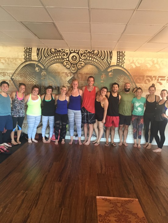 Yoga with my team this morning. My shirt is soaked with sweat!